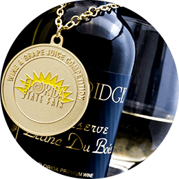 Bottle of Lakeridge Winery Blanc Du Bois wine with a gold medal from the Florida State Fair wine competition.