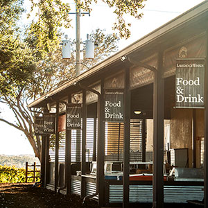 The food and wine bars outside on the fair grounds under the pavilioin.